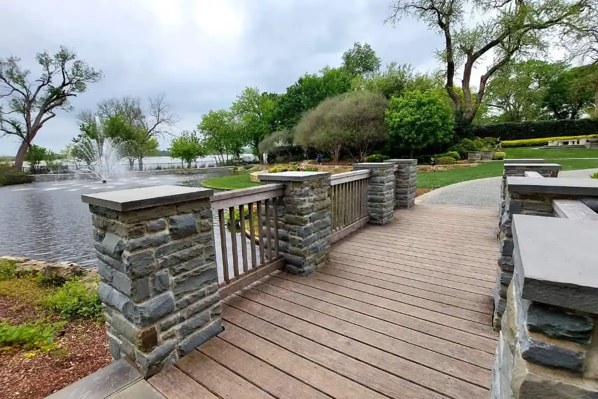 Lush blooming flower beds framing scenic pathways at the Dallas Arboretum