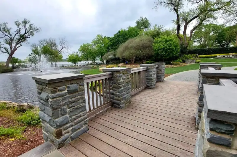 Lush blooming flower beds framing scenic pathways at the Dallas Arboretum