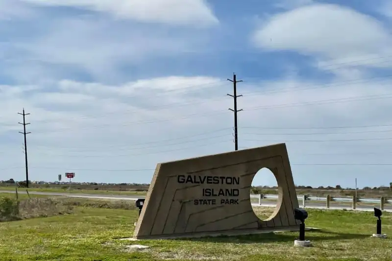Galveston Island State Park coastal boardwalk extending toward Gulf of Mexico dunes