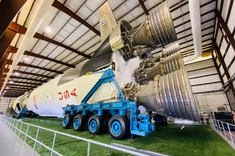 Authentic Saturn V rocket displayed horizontally inside George WS Abbey Rocket Park at Space Center Houston