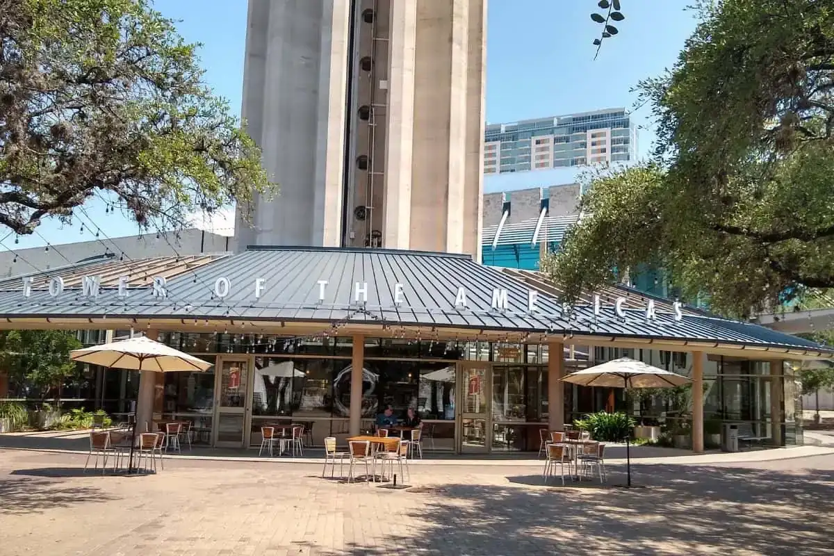 Panoramic view of the 750-foot Tower of the Americas rising above Hemisfair Park in downtown San Antonio