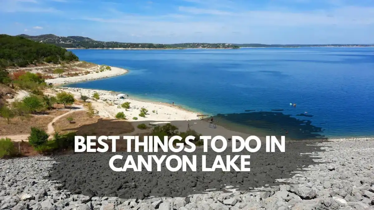 Aerial view of boaters navigating turquoise waters surrounded by limestone bluffs at Canyon Lake Texas