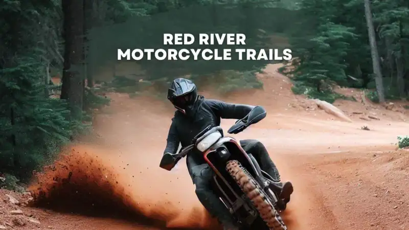 Riders on off-road dirt bikes navigating rugged limestone bluffs and sandy trails at Red River Motorcycle Trails in Bulcher Texas