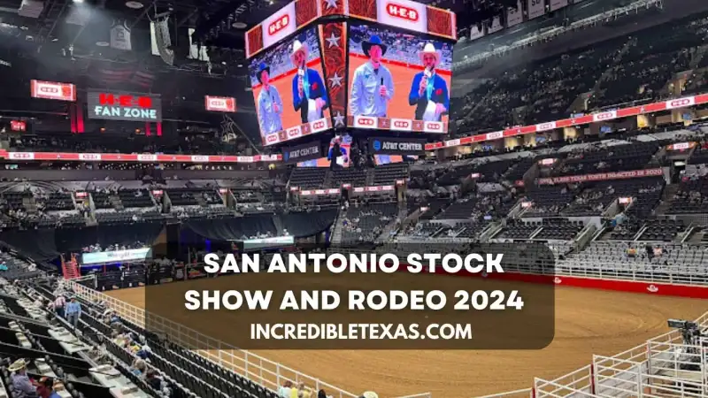 Action shot of a rodeo rider competing at the San Antonio Stock Show and Rodeo in the Frost Bank Center