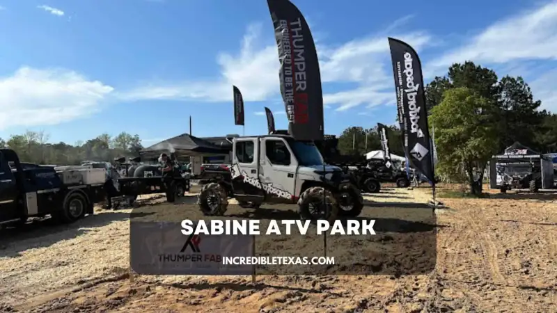 Lifted side-by-side vehicle navigating deep mud trails at Sabine ATV Park in Burkeville