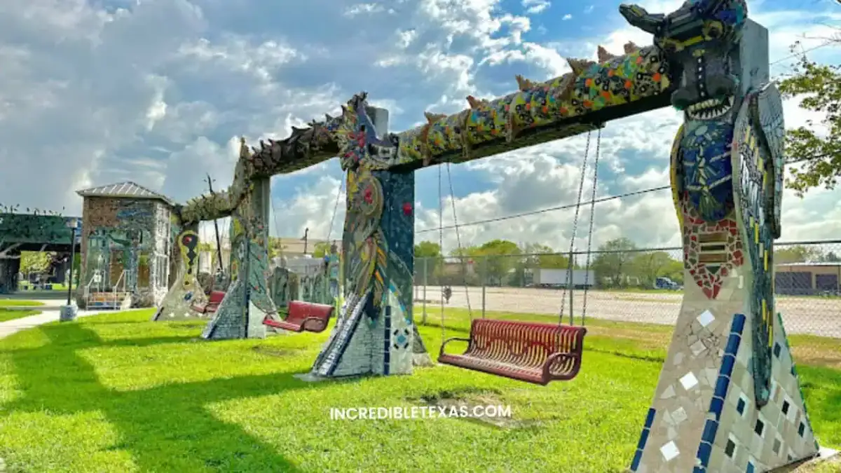 Intricate mosaic covered archways and decorative walls at Smither Park