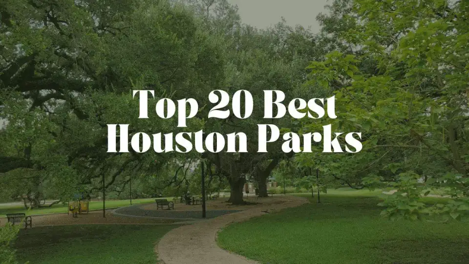 Panoramic view of downtown Houston skyline over lush green parkland