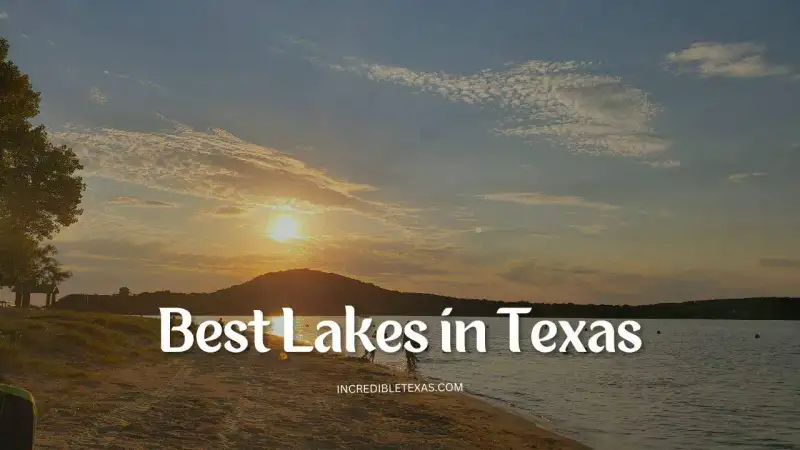 Scenic overview of clear blue Texas lake waters bordered by limestone bluffs and rolling green hills