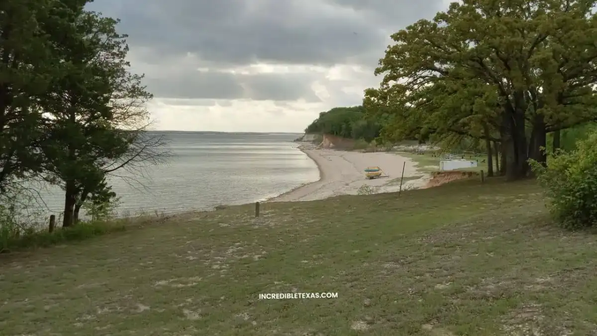 Scenic shoreline and open waters of Lake Texoma near Denison Texas with limestone bluffs