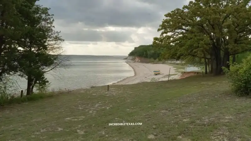 Scenic shoreline and open waters of Lake Texoma near Denison Texas with limestone bluffs