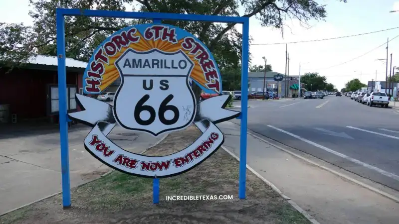 Historic Route 66 neon sign and vintage buildings in a Texas Panhandle town