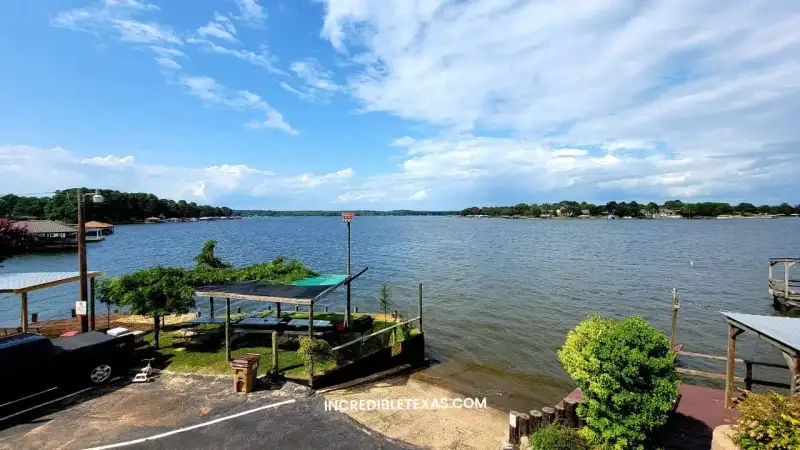 Panoramic shoreline view of Lake Palestine in East Texas with tranquil fishing coves and boat docks