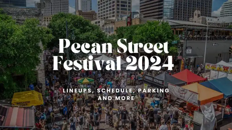 Outdoor artisan market tents and festival attendees at Pecan Street Festival