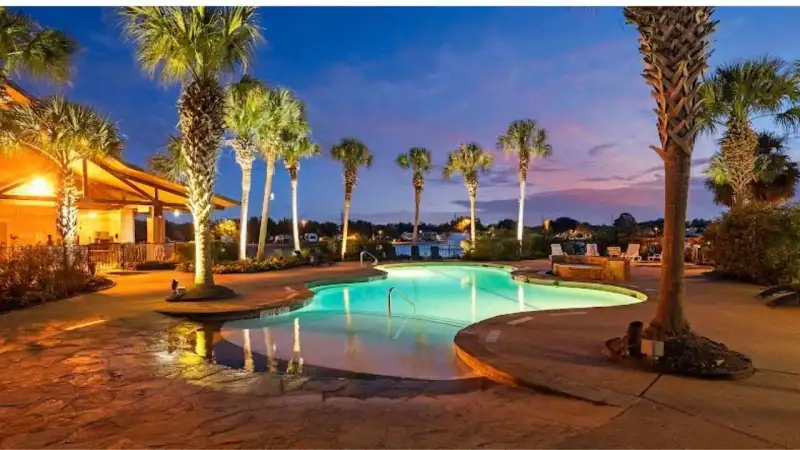 Central stocked fishing lake with fountain and RV sites at Lakeview RV Resort Houston