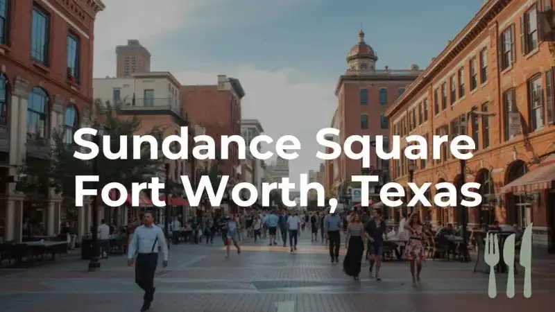 Pedestrian plaza at Sundance Square in downtown Fort Worth with fountains and giant umbrellas