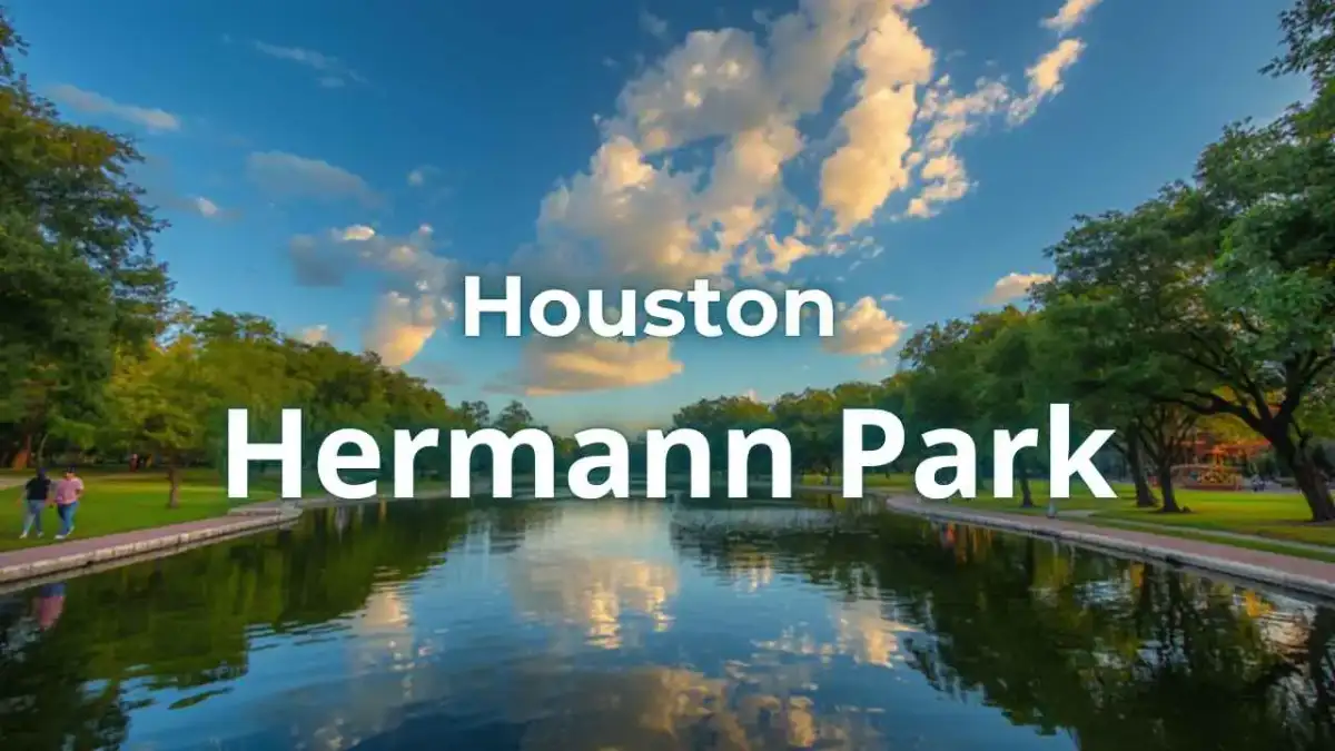 Aerial view of Hermann Park in Houston featuring McGovern Lake and surrounding gardens
