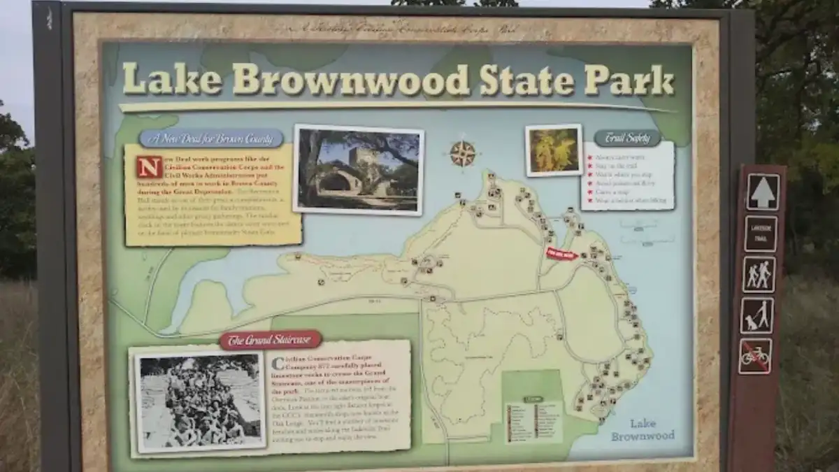 Rustic Civilian Conservation Corps sandstone pavilion and shoreline at Lake Brownwood State Park