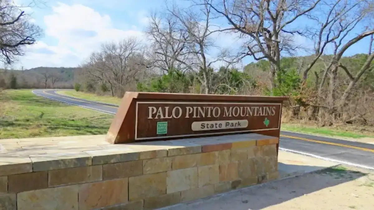 Rugged limestone hills, oak woodlands, and trailheads at Palo Pinto Mountains State Park in North Texas