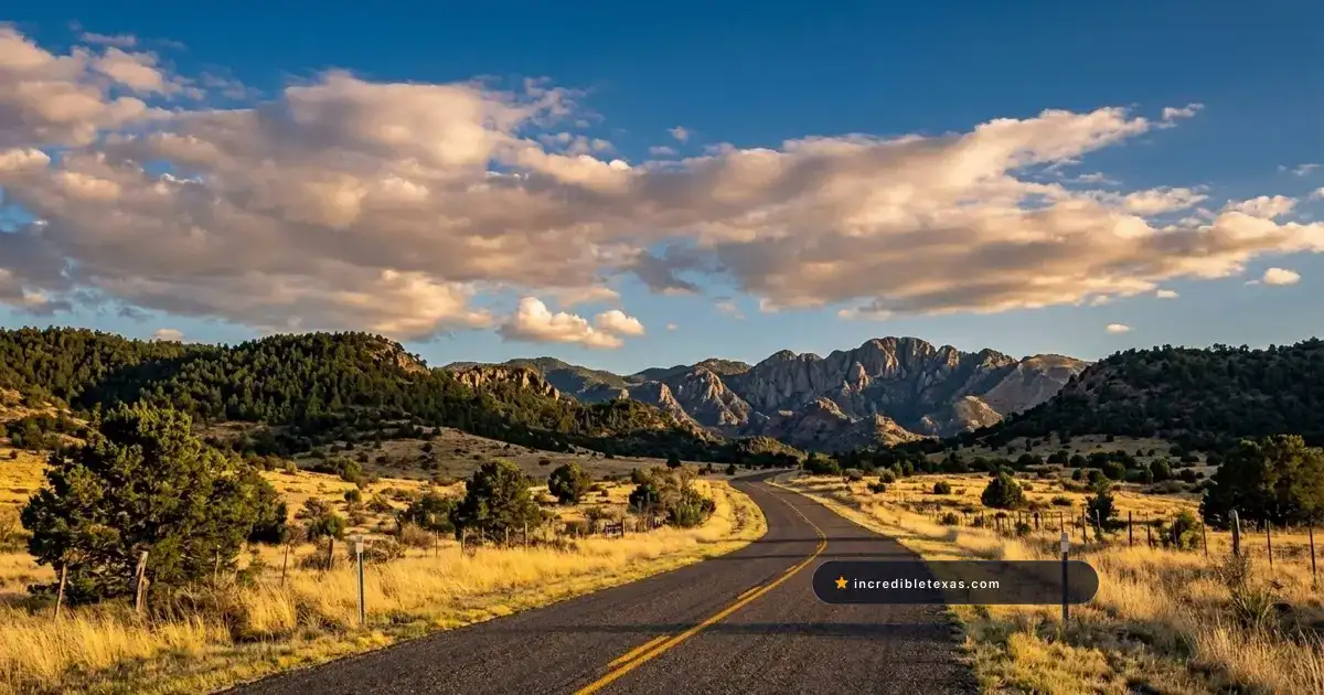 Two-lane highway leads toward rugged volcanic peaks on the Davis Mountains Scenic Loop