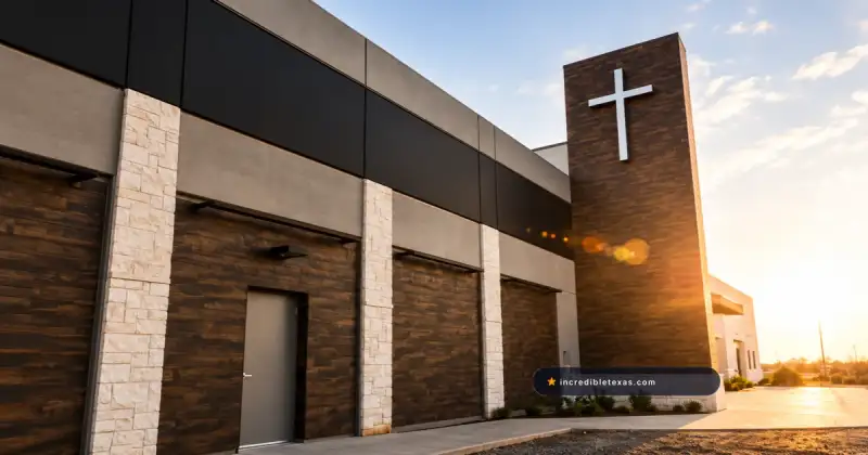Hill Country Bible Church Lakeline campus with dark cladding, limestone columns, and a cross tower