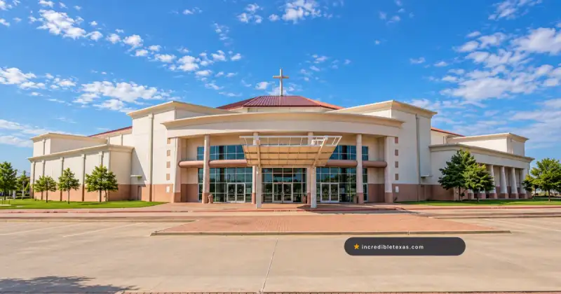 Pale worship center and central glass lobby at Inspiring Body of Christ Church on South Westmoreland Road in Dallas