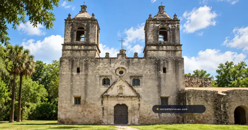 Mission Concepción in San Antonio, with its twin limestone bell towers and carved Spanish Colonial doorway
