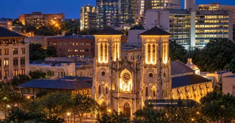 San Fernando Cathedral at Main Plaza in San Antonio, with twin illuminated stone bell towers