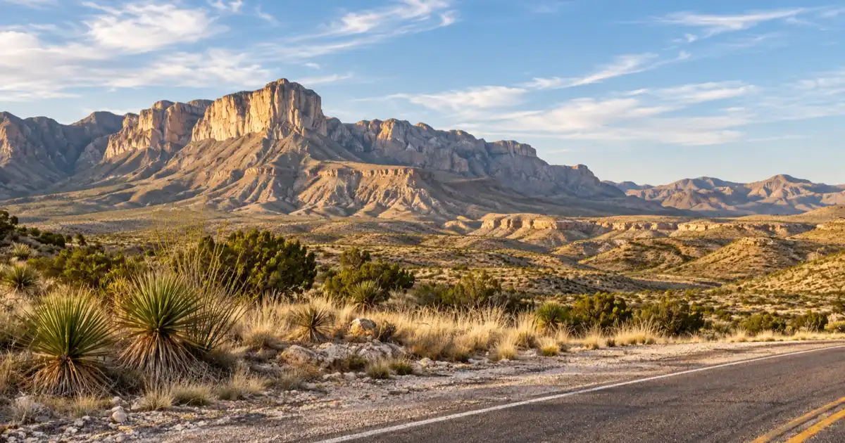 Limestone escarpments rise beside US 62/180 near Guadalupe Pass in West Texas.